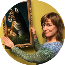 Heather Whitaker, standing next to a velvet painting of a mountain lion