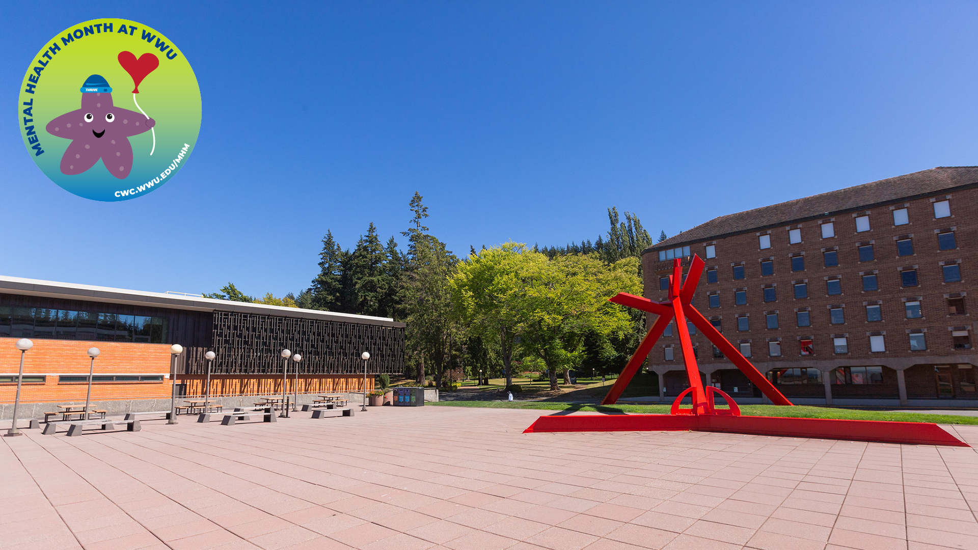 A sculpture on the WWU Performing Arts Plaza with a Mental Health Month starfish holding a red balloon in the top left corner