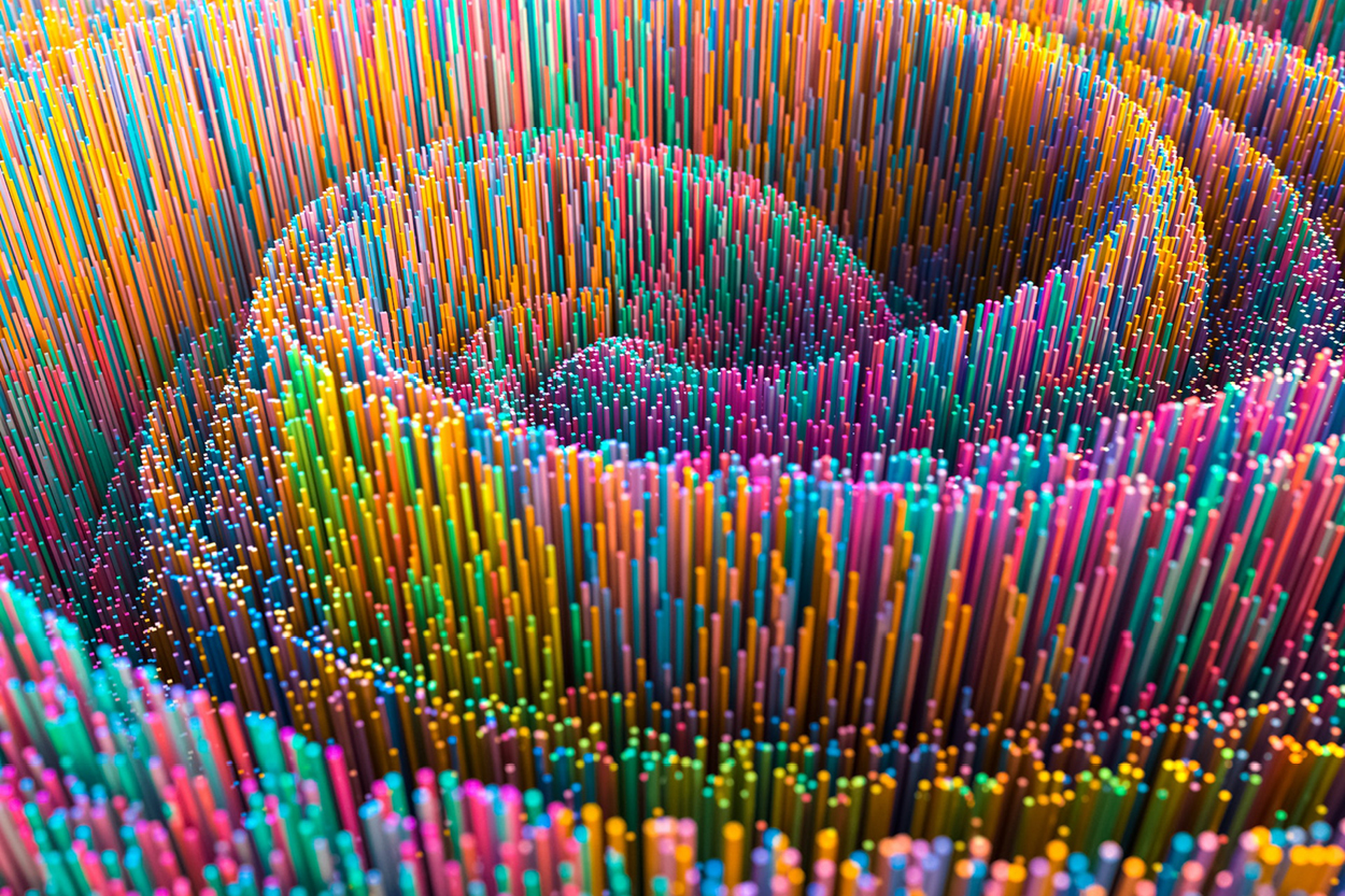 A multitude of brightly colored wires in a spiral pattern