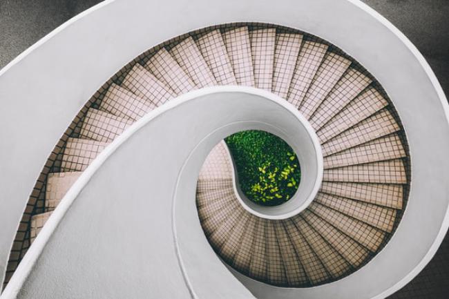 Perspective looking down on a spiral staircase